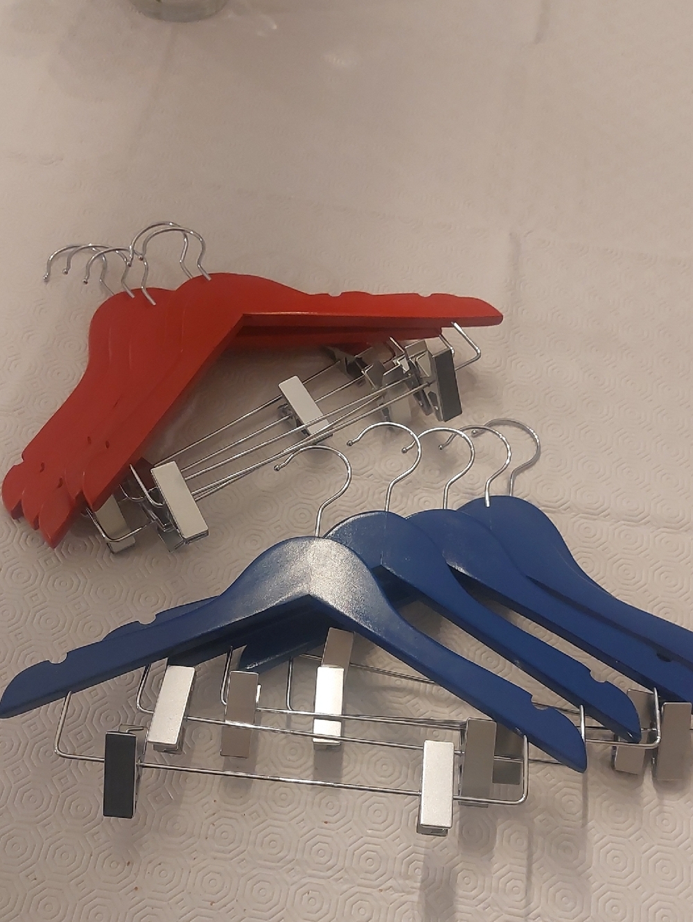 Set of Blue and Red Wood Clothes Hangers with Clips